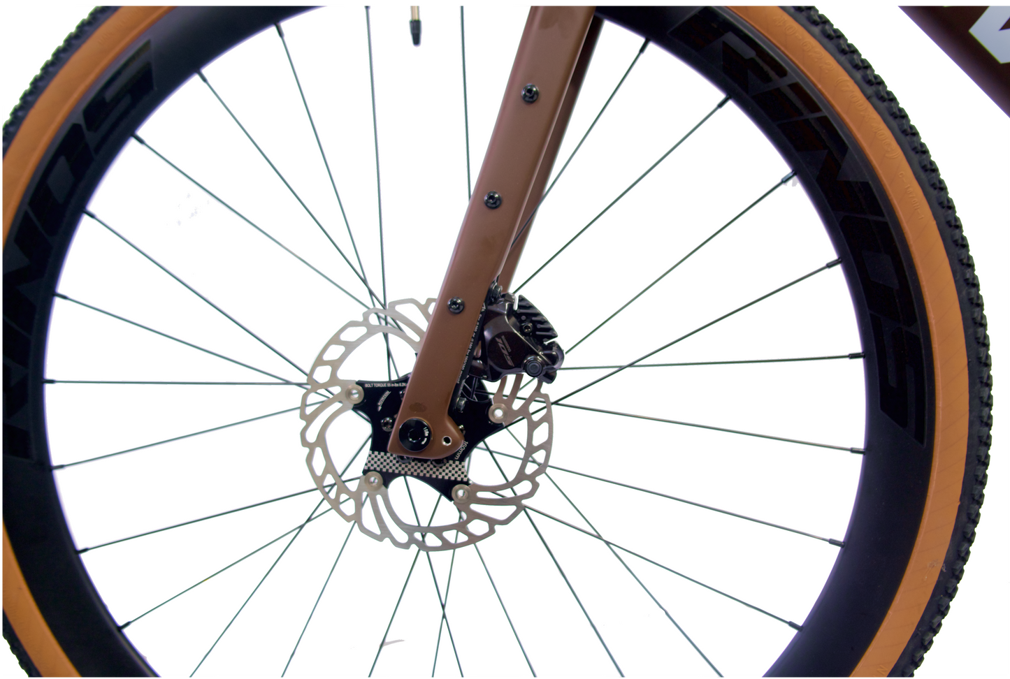 Close-up of a 'Rinos' wheel with a front hydraulic disc brake system